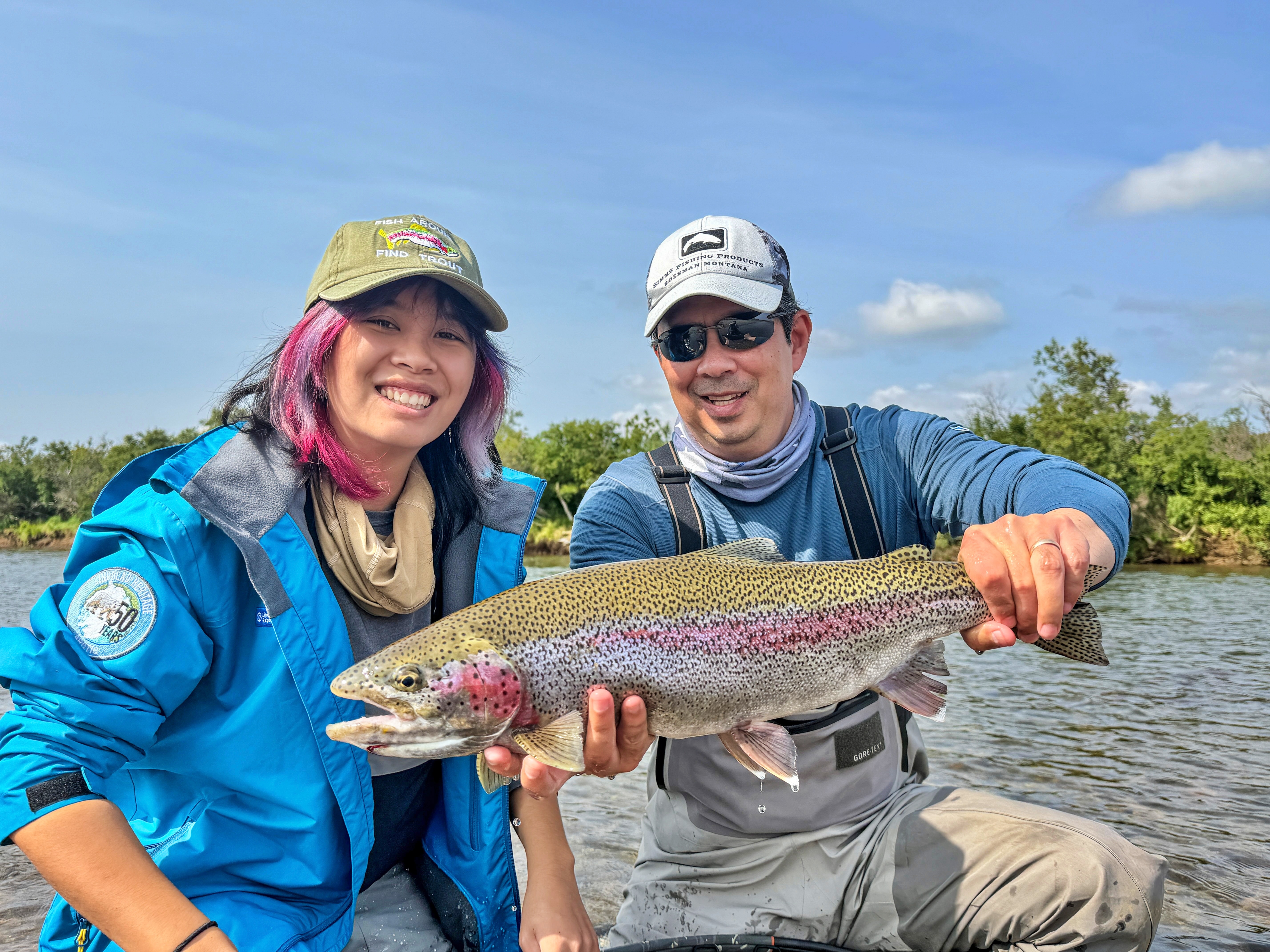 The author and his daughter with a beautiful Moraine Creek Rainbow Trout
