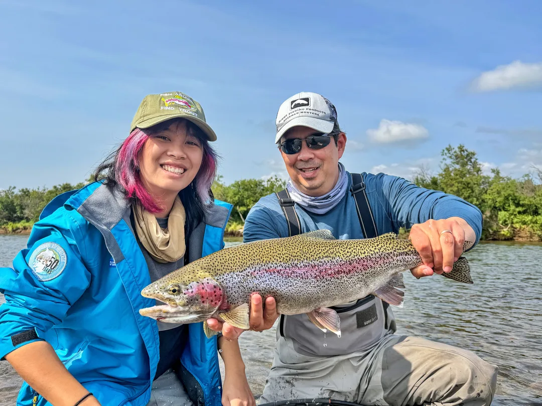 The author and his daughter with a beautiful Moraine Creek Rainbow Trout