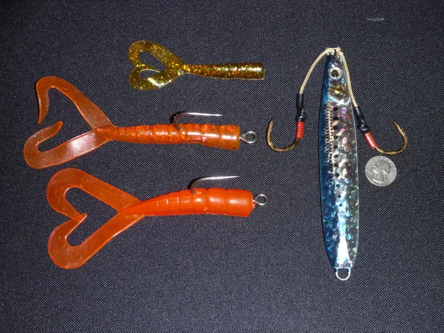 Scampi tail plastics and a Shimano Butterfly jig.  Red seems to work well even though it is the first color to disappear underwater and looks gray down at the bottom.