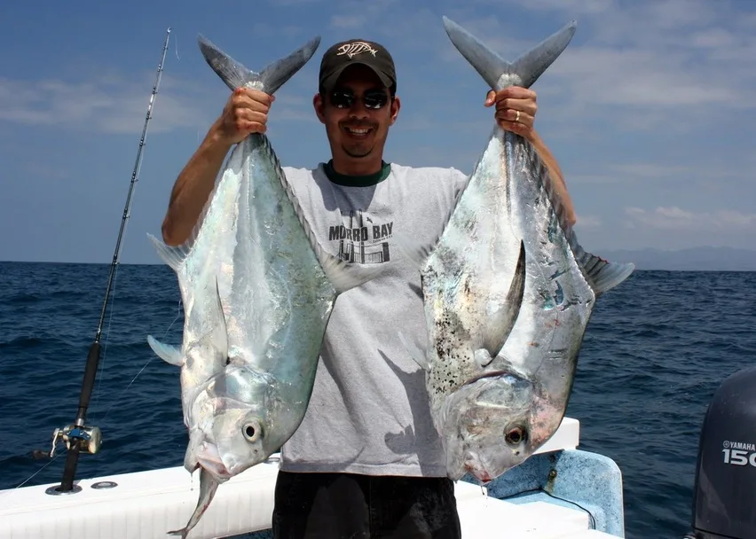 Two African Pompano caught in Puerto Vallarta, Mexico.  One of them wouldn't let go of the bait.