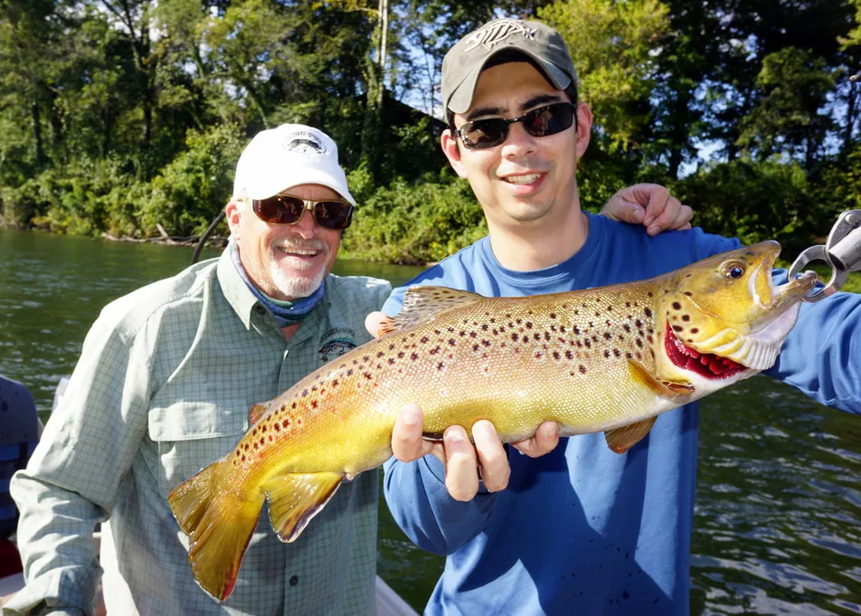 The author with a Brown Trout caught on a jerk bait on the White River in Arkansas