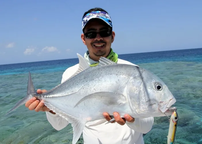 A small Giant Trevally taken on a Super Spook on the Great Barrier Reef, Australia