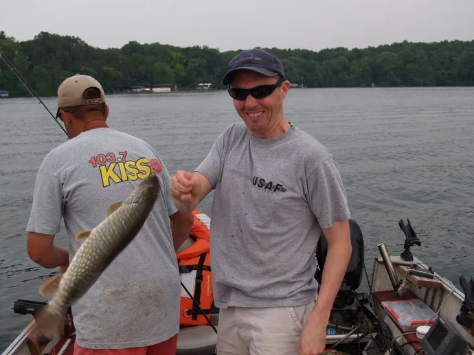 My friend Rob demonstrating how to properly grasp a Pike in Pine Lake, Wisconsin