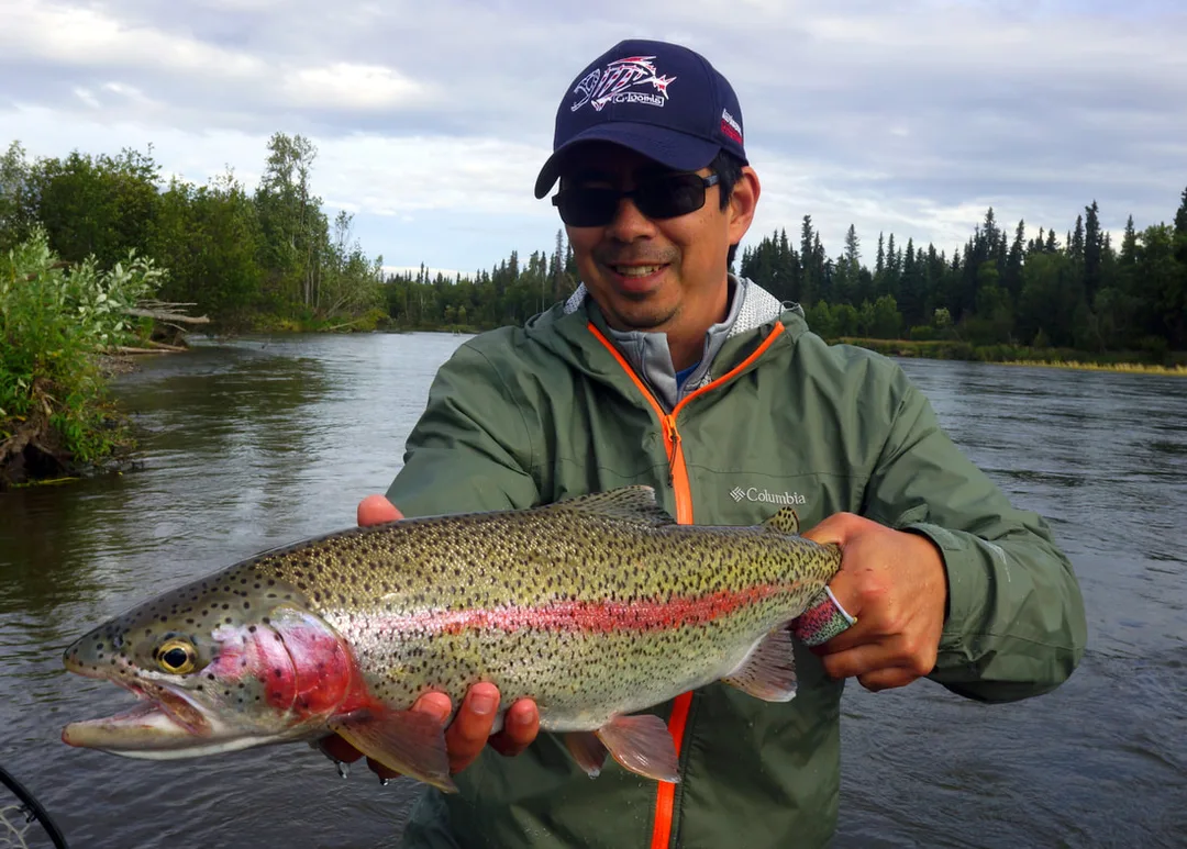 Supporting a fish's weight evenly is much better for them than holding them up by the jaw.