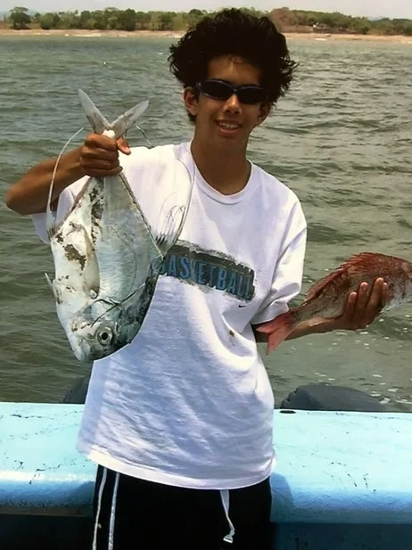 Juvenile African Pompano have long filaments coming off their fins, as show in this photo of the author's brother.