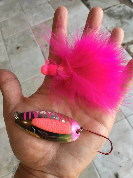 Some good lures for Cohos in rivers:  a pink marabou jig and a rattling Pixee spoon.