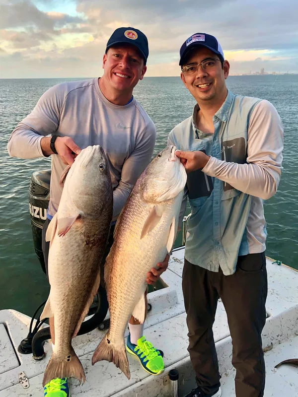 A couple of healthy Redfish caught in Galveston, Texas on mullet and a bucktail jig, respectively
