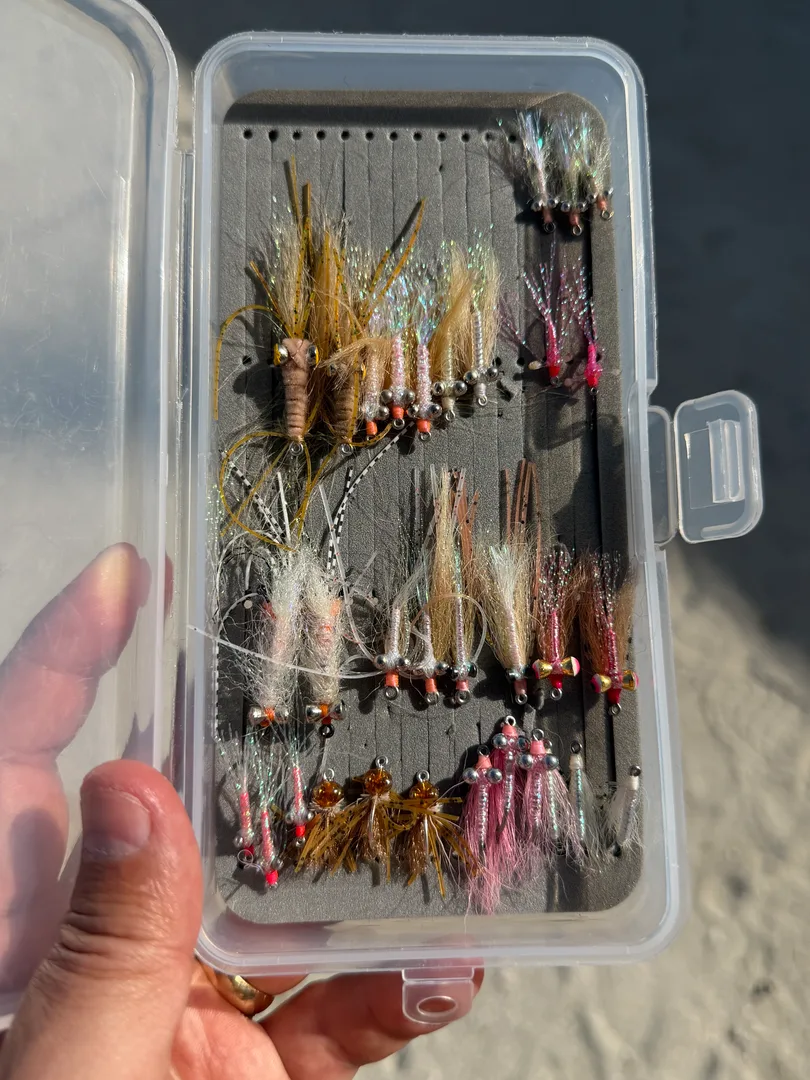 A box of Bonefish flies. Crazy Charlies, Gotchas, and Christmas Island Specials are popular in White, Tan, Pink, and Orange