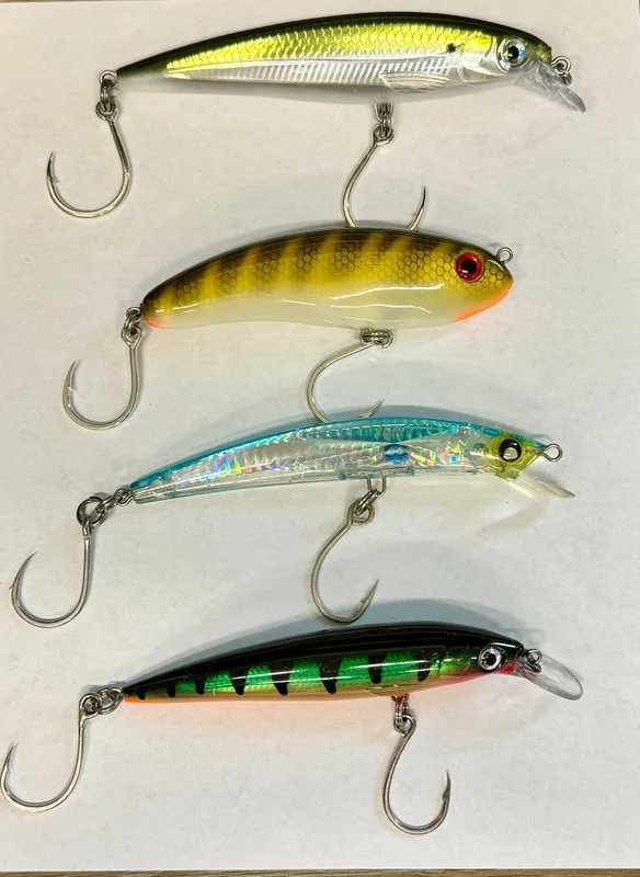 Top to bottom: Rapala X-Rap, Borboleta Safada, Yo Zuri Crystal Minnow, smaller Rapala X-Rap