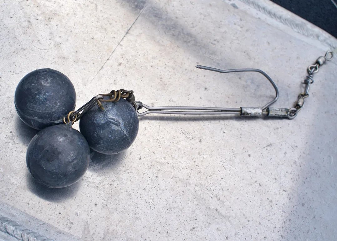 A simple device like this can be used to release Rockfish down deep to help them survive barotrauma.  Attach the hook to the lower jaw, and send it down on a heavy line.  When it has gone down enough that you think the air bladder has deflated, give it a quick jerk to release the fish and reel the device back up.