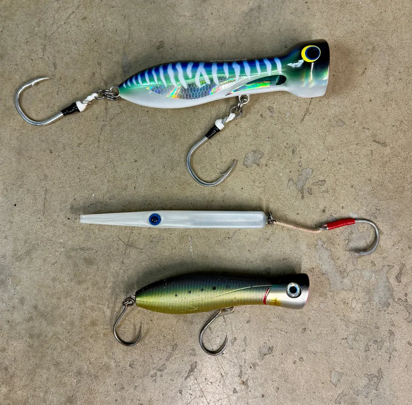 Some topwater lures that work for Roosterfish - Nomad Chug Norris, GT Ice Cream, Yo Zuri Sashimi Bull. The last one can be skittered across the top or chugged, making it versatile
